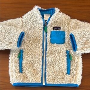 PATAGONIA TODDLER-Retro-X Jacket in cream with blue trim and green accents. 3T